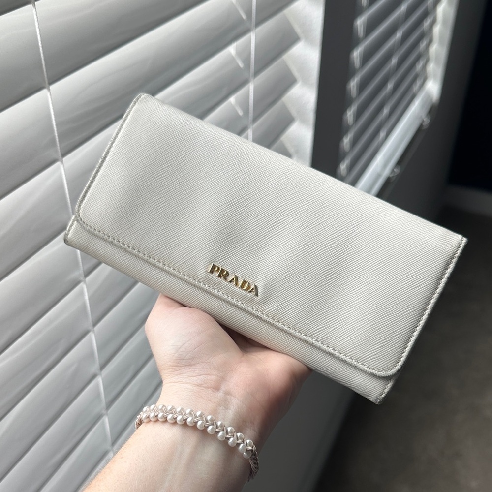Prada Ivory Wallet with Gold Logo